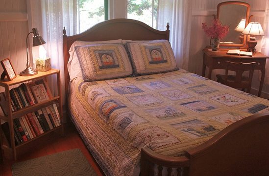 Waipio Wayside, Moon Room, Bed nightstand with mirror and small bookshelf